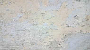 Yıpranmış beton duvar, eskimiş çimento dokusu, tasarım elementleri için sert taş yüzey.