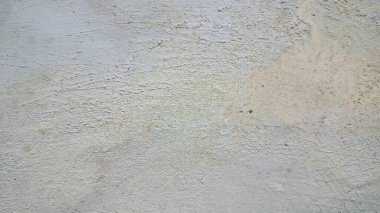 Hışırtılı beton doku, yıpranmış taş yüzey, eskimiş duvar arkaplanı, sert çimento kalıpları ve soyut endüstriyel doku tasarım elementi.