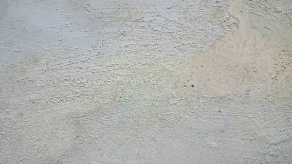 Hışırtılı beton doku, yıpranmış taş yüzey, eskimiş duvar arkaplanı, sert çimento kalıpları ve soyut endüstriyel doku tasarım elementi.