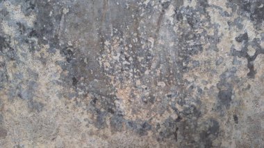 Arka plan veya grafik tasarımı için yıpranmış taş yüzeyi olan sıkıntılı grunge beton dokusu