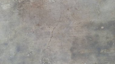 Arka plan veya grafik tasarımı için yıpranmış taş yüzeyi olan sıkıntılı grunge beton dokusu