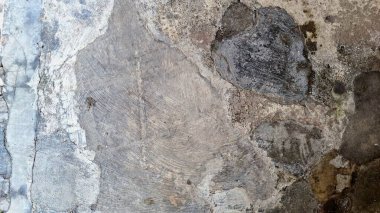 Çamurlu duvar dokusu yıpranmış yüzeyi ve eskimiş taş arka planı var. Grafik veya web tasarımı için mükemmel.