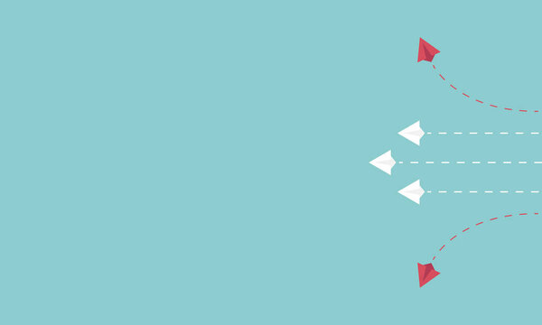 Минималистские два красных самолета меняют направление и белые. Новая идея, изменение, тренд, смелость, творческое решение, инновация и концепция уникального пути.