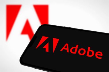 Chittagong, Bangladeş - 21 Eylül 2024: Adobe Logosu akıllı telefonda gösteriliyor.