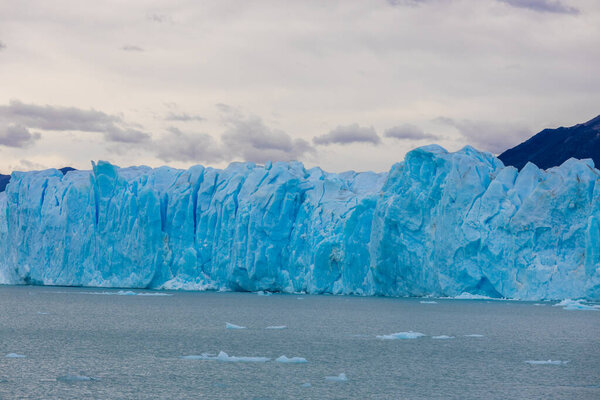 Perito Moreno glacier blue ice in Patagonia, Argentina. Patagonian beautiful mountain scenery of the national park Los Glaciares on the border Argentina and Chile stunning glacier ice landscape