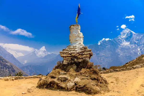 stock image Stupa with Buddha eyes in Nepal. Religious building of buddhism pagoda in the high Himalaya mountains and Kathmandu capital city. Sacred place of Buddhism with prayer flags in beautiful peaceful place