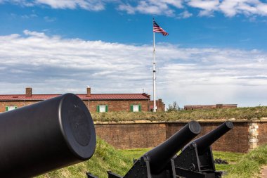 Canons at Fort McHenry with United States Flag American clipart