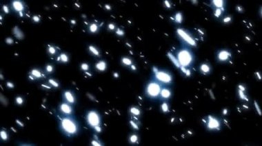 Kardaki kar kristalleşir ve dans siyah arka planda gerçekleştirilir. Nadir kar akıntıda yavaş ilerliyor.