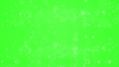 yeşil ekran (kroma anahtarı) Bokeh parçacıkları kameraya doğru hareket ediyor, bayram festivali kutlaması, soyut döngü animasyon arka planı