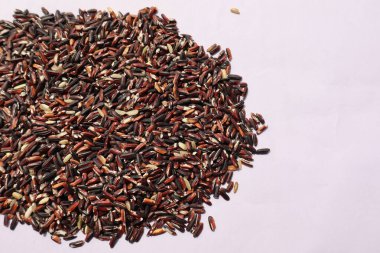 black rice (or) forbidden rice in white background clipart