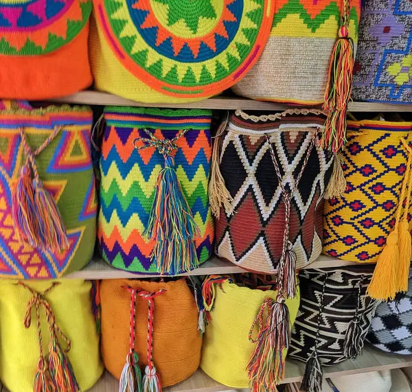 Stock image A vibrant display of traditional hats for sale in the bustling markets of Fez, Morocco.