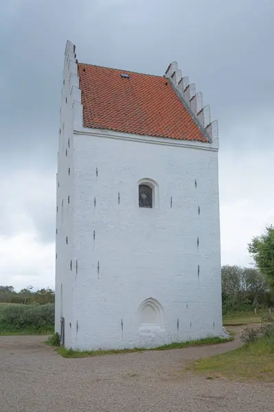 stock image The Tower of the Sand buried Church from the 14th century in Skagen, Denmark, May 30, 2024