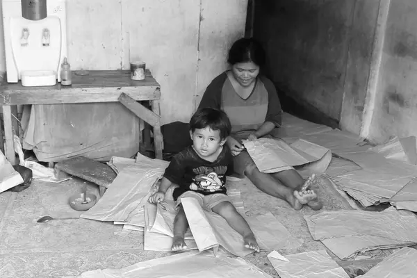 stock image life of urban communities living near the railroad tracks, children of workers, schools taken in Malang Add on June 6 2024