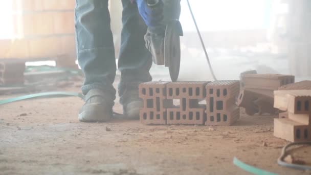 Close Construction Worker Use Grinder Cut Bricks Construction Site Slow — Stock Video