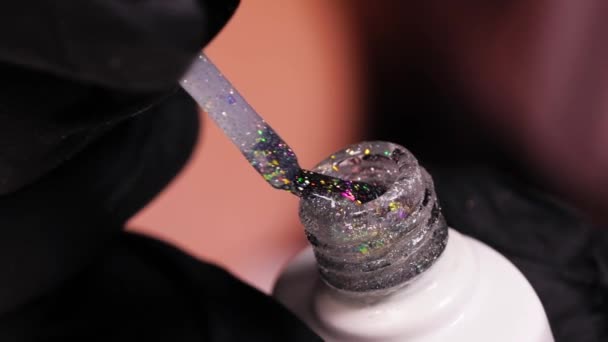 Nail Polish Transparent Glitter Brush Comes Out Bottle Slow Motion — Stock Video
