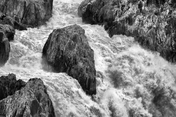 stock image the spectacular Barron Falls near Kuranda, FNQ, Australia, in full flow during the wet season. Marvel at the powerful cascade of water surrounded by lush rainforest, creating a breathtaking and dramatic natural spectacle