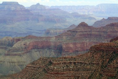 Büyük Kanyon Ulusal Parkı, Arizona, ABD 'nin Güney Halkası' ndan hayranlık uyandırıcı görüntüler. Dramatik uçurumlara, geniş manzaralara ve bu ikonik doğa harikasının nefes kesici güzelliğine hayran kaldım.