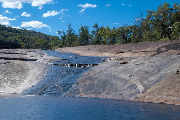 stock image Bald Rock Creek in Girraween National Park, South East Queensland, Australia. This scenic spot features clear waters, granite boulders, and diverse flora, perfect for nature walks and outdoor exploration