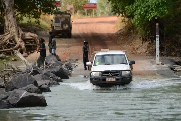 Stock image At Cahill's Crossing, Northern Territory, witness crocodile-infested waters where wildlife and danger meet in Australia's rugged wilderness.