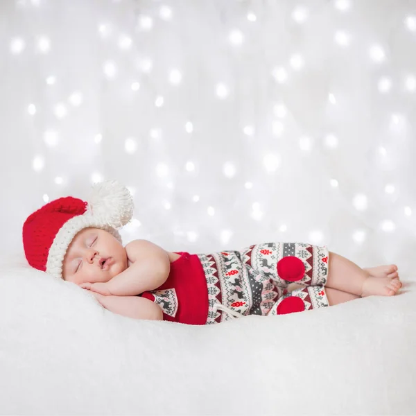 stock image Adorable sleeping newborn baby wearing Santa Claus hat, Christmas, New Year