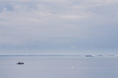 Landscape Long exposure of majestic clouds in the sky sunset or sunrise over sea with reflection in the tropical sea.Beautiful cloudscape scenery.Amazing light of nature Landscape nature background