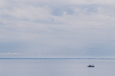 Landscape Long exposure of majestic clouds in the sky sunset or sunrise over sea with reflection in the tropical sea.Beautiful cloudscape scenery.Amazing light of nature Landscape nature background