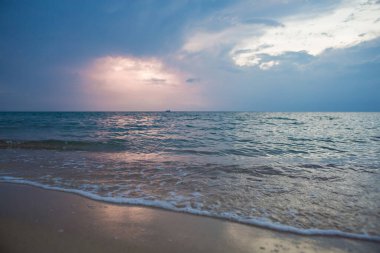 Landscape Long exposure of majestic clouds in the sky sunset or sunrise over sea with reflection in the tropical sea.Beautiful cloudscape scenery.Amazing light of nature Landscape nature background