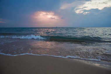 Landscape Long exposure of majestic clouds in the sky sunset or sunrise over sea with reflection in the tropical sea.Beautiful cloudscape scenery.Amazing light of nature Landscape nature background