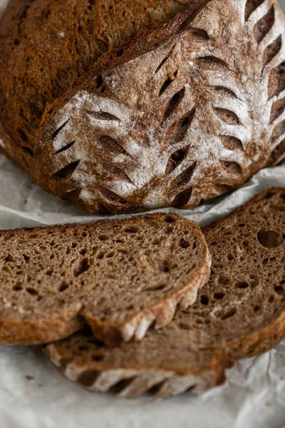 stock image Healthy rye bread slices on the plate on concrete background