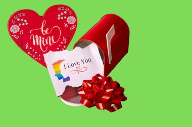 A red mailbox surrounded by heart-shaped decorations, perfect for Valentines Day. Green screen background clipart