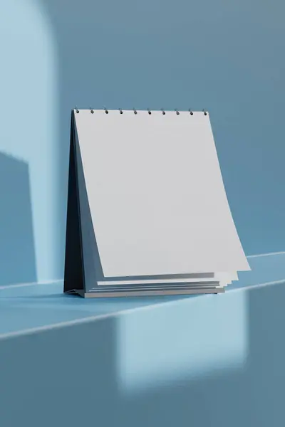 Masanın üzerinde dik duran bir takvim