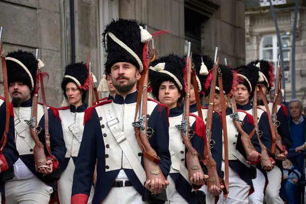 stock image Vigo, Pontevedra, Spain; April 7, 2024; the reconquest of Vigo against the French in the old town of Vigo. French troops patrol the city of Vigo after having conquered it