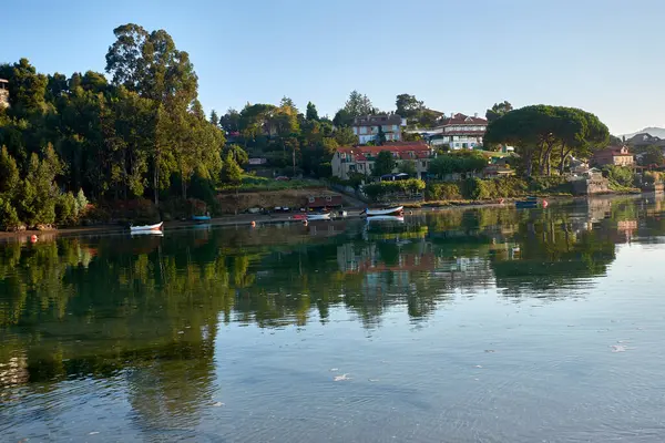 stock image Stunning Foz del Mior Vista from Camping Playa Ladeira During High Tide. The elevated vantage point from the campsite offers a sweeping view of this natural wonder, where the meeting of river and sea creates a picturesque and serene landscape