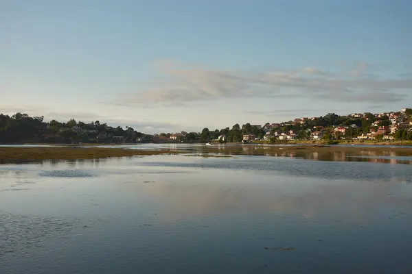 stock image the serene beauty of Foz del Val Mior at sunset in Ramallosa The peaceful atmosphere highlights the natural beauty of this Galician landscape, where the Mior River meets the sea