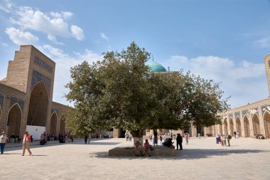 Bukhara, Uzbekistan;September,20,2024:The courtyard of Poi Kalyan Madrasa in Bukhara, Uzbekistan, is a stunning example of Islamic architecture and design. This historic madrasa is part of the larger Po-i-Kalyan complex,  clipart