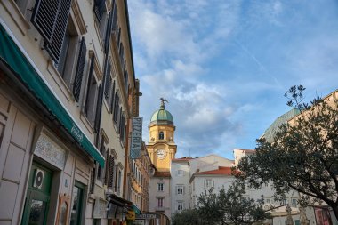 Rijeka, Croatia;October,13,2024:The Yellow Civic Tower, also known as the Clock Tower, is a historic landmark and a prominent symbol of Rijeka, Croatia. Located along Korzo, the citys bustling pedestrian street clipart