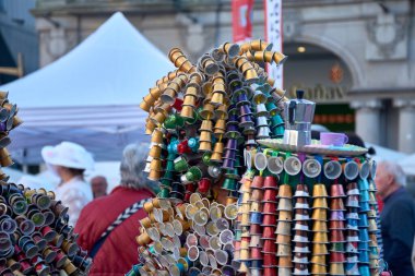 Vigo,Pontevedra,Spain;March 4, 2025:A striking carnival costume made entirely from recycled coffee capsules stands out at the lively Vigo Carnival in Spain. The unique outfit features hundreds of colorful coffee pods arranged in an artistic design clipart