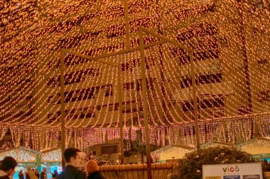 Vigo, Spain - December 13, 2024,The streets of Vigo, Spain, are filled with light and color with its famous Christmas decorations, attracting visitors from all over the world. 