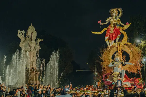 stock image Denpasar, Indonesia - March 1, 2024: Ogoh-Ogoh Parade at Kilometer Zero (KM.0) in Bali Island.