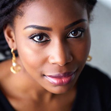 Ethnic-themed close-up of an African American woman, taken from an overhead perspective with deep focus. The closeup portrait. Photo-realistic. clipart