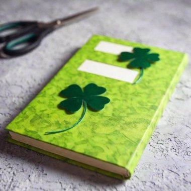 handmade book with a Shamrock cover clipart