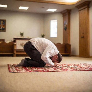 Yom Kippur religious observance: A male figure bowing in prayer, captured from ground level, with rack focus used in a full shot to transition attention between elements in the scene. clipart