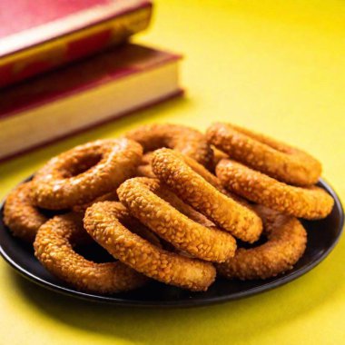 fried sausage with onion on a plate clipart