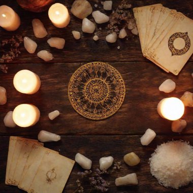 mystical flatlay with candles, crystals, tarot cards around the perimeter clipart