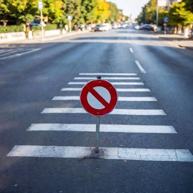 stop sign on the road clipart