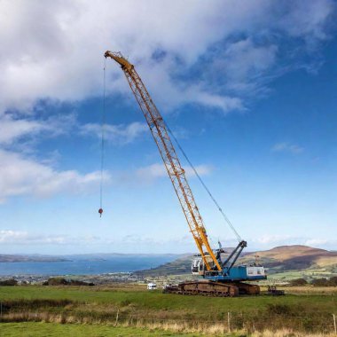 construction site with crane and building building clipart