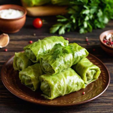 Cabbage rolls stuffed with buckwheat groats. medium long shot photo of a Polish Christmas Eve dinner, clipart