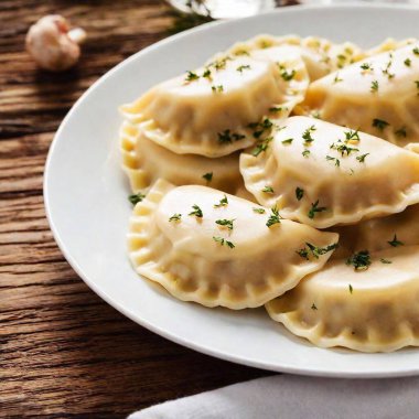 close up image of Mushroom and cabbage pierogi. Polish Christmas Eve dinner at eye level, focusing on meal clipart