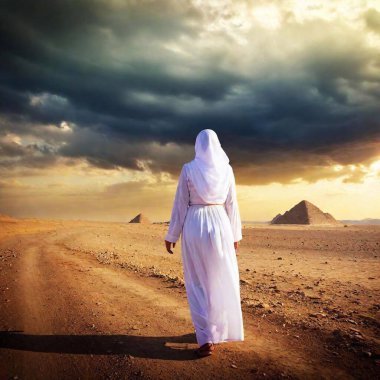 woman in ancient middle eastern clothing walking away from camera under empty sky no vignette clipart