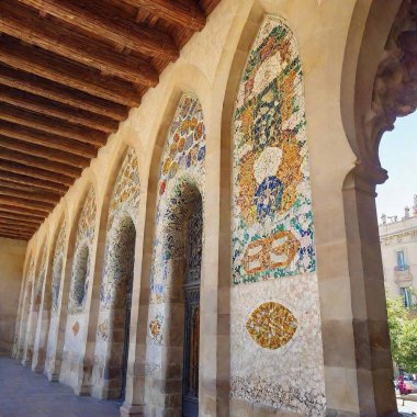 an Antonio Gaudi mosaic style palace in the center of medieval Barcelona city landscape clipart